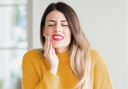 Stressed woman complaining suffering toothache