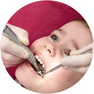 Closeup shot of a young girl having a checkup at the dentist