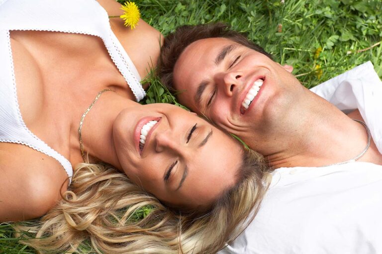 Happy couples laughing with Veneers